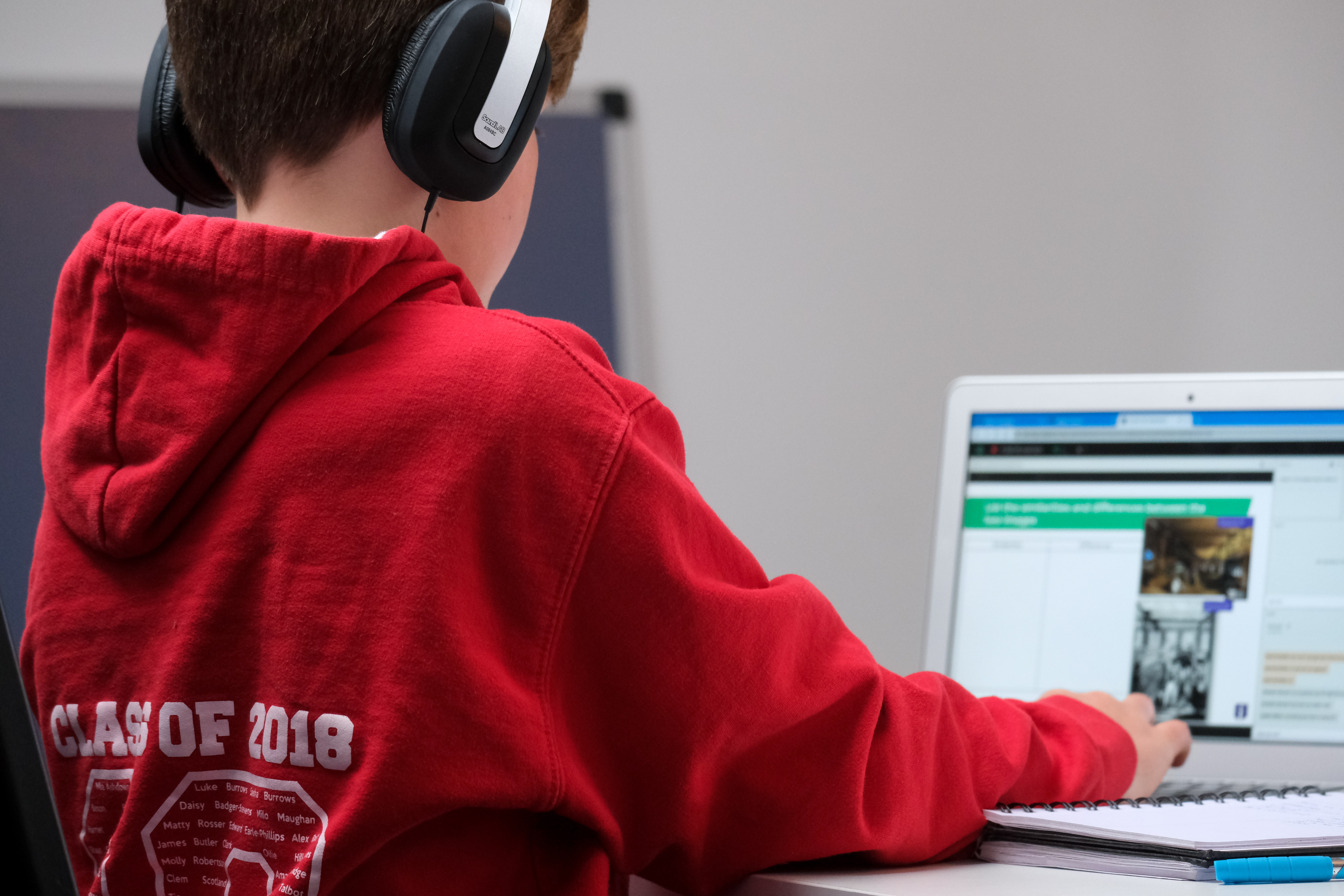 A student using a laptop