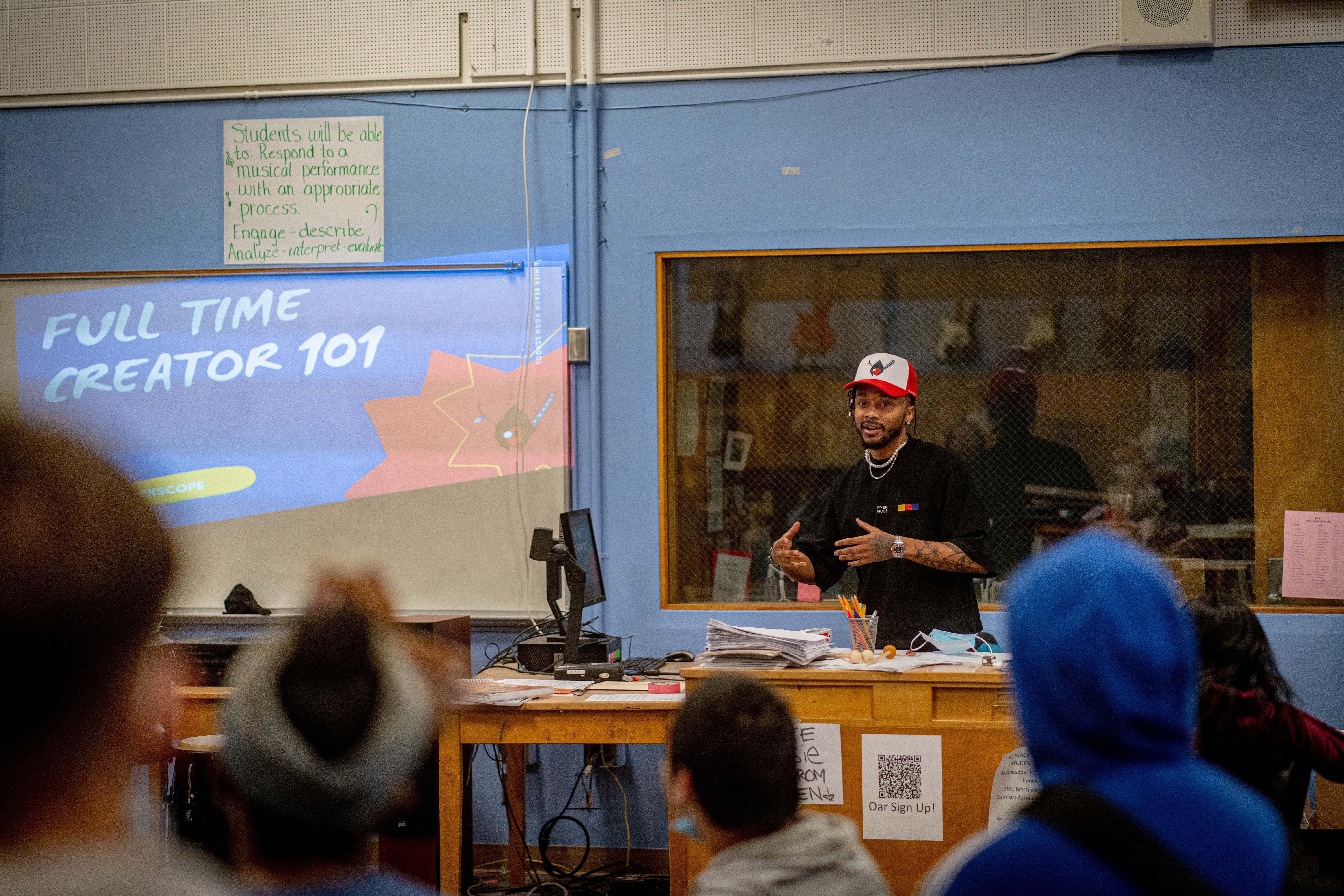 a person giving a presentation in a classroom