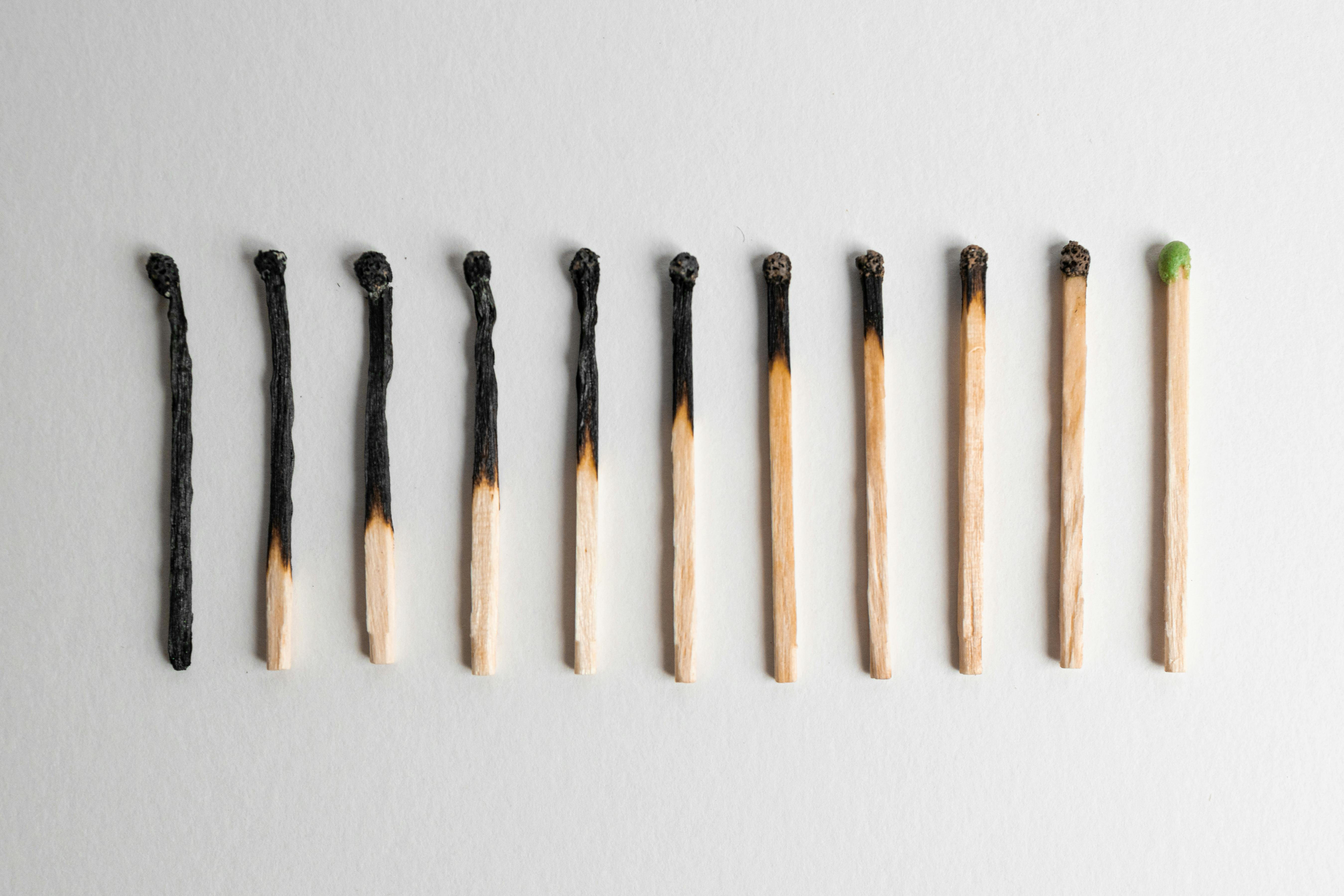 Burnt Matchsticks on a white background