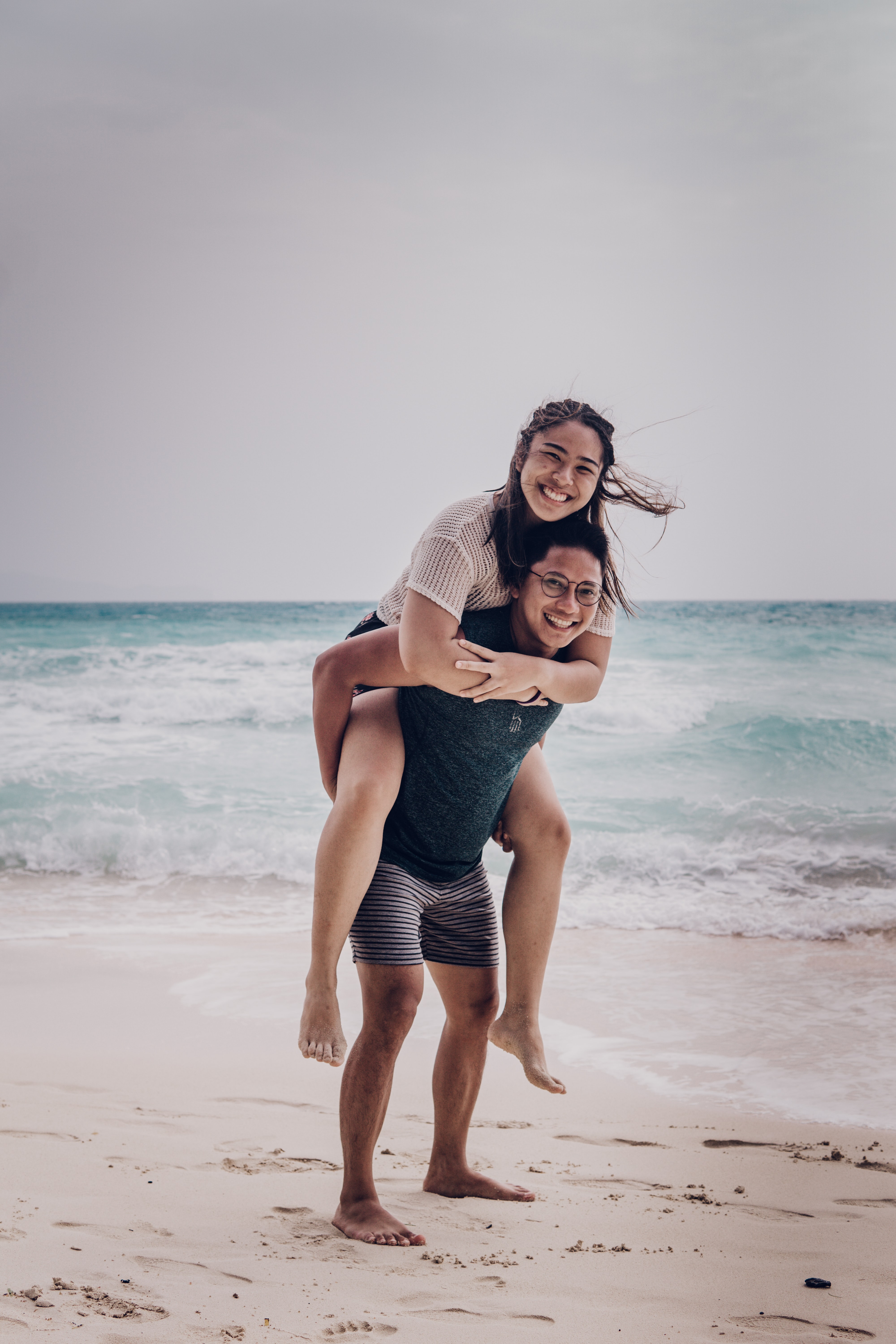 A man and woman on a beach