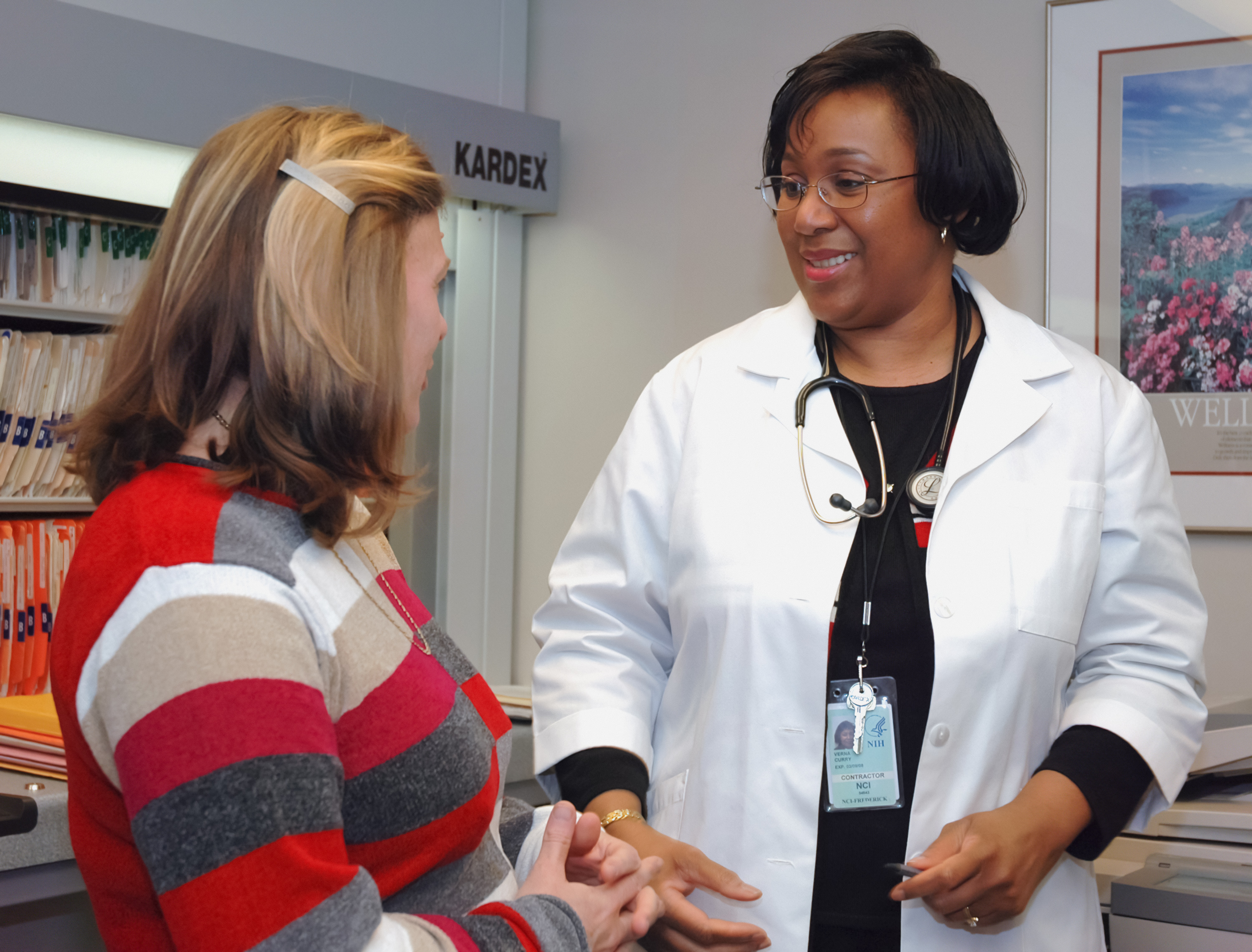 a doctor talk talking to a patient