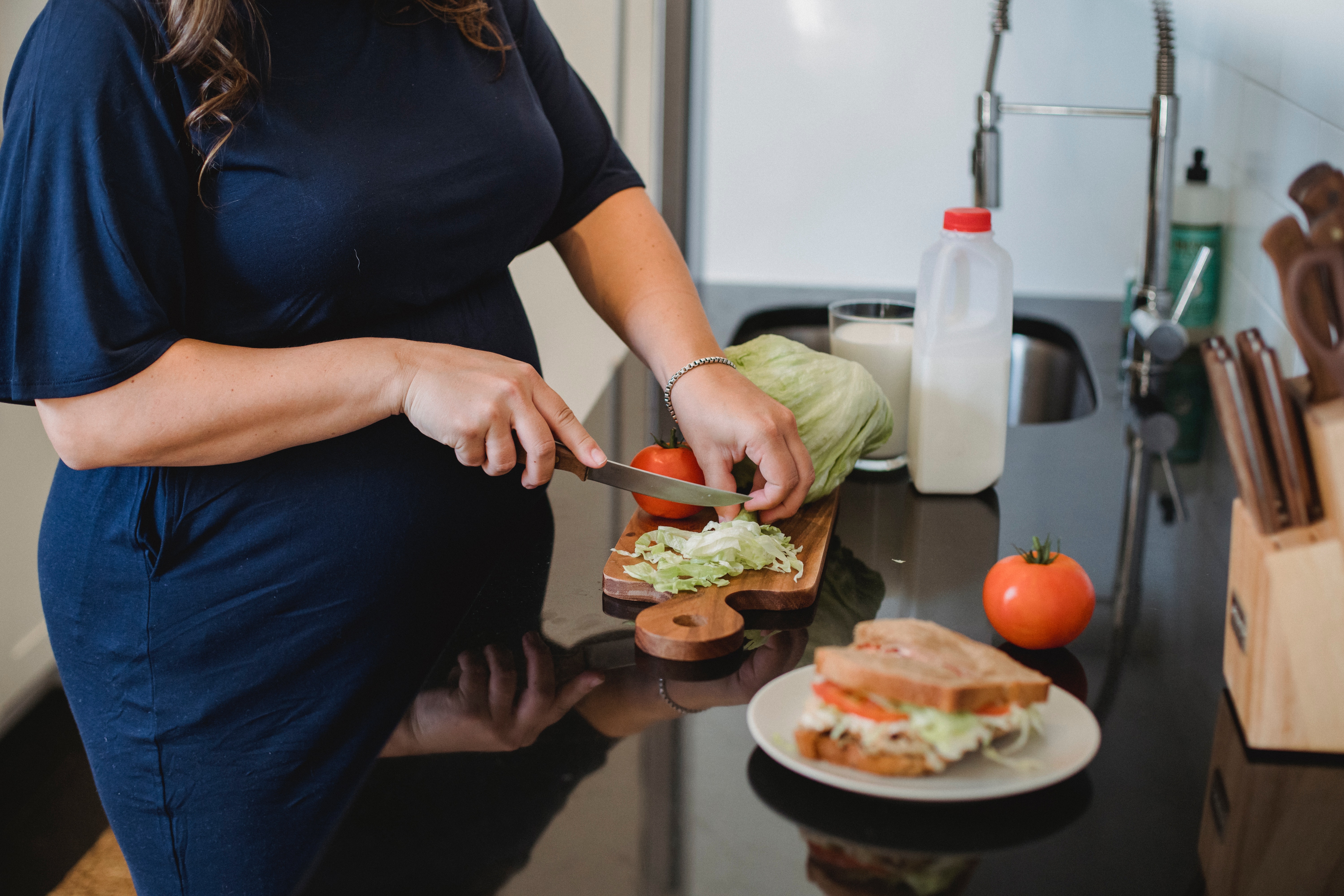 A woman cutting vegetables